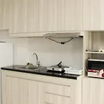Nice And Comfy Studio Azalea Suites Apartment By Travelio